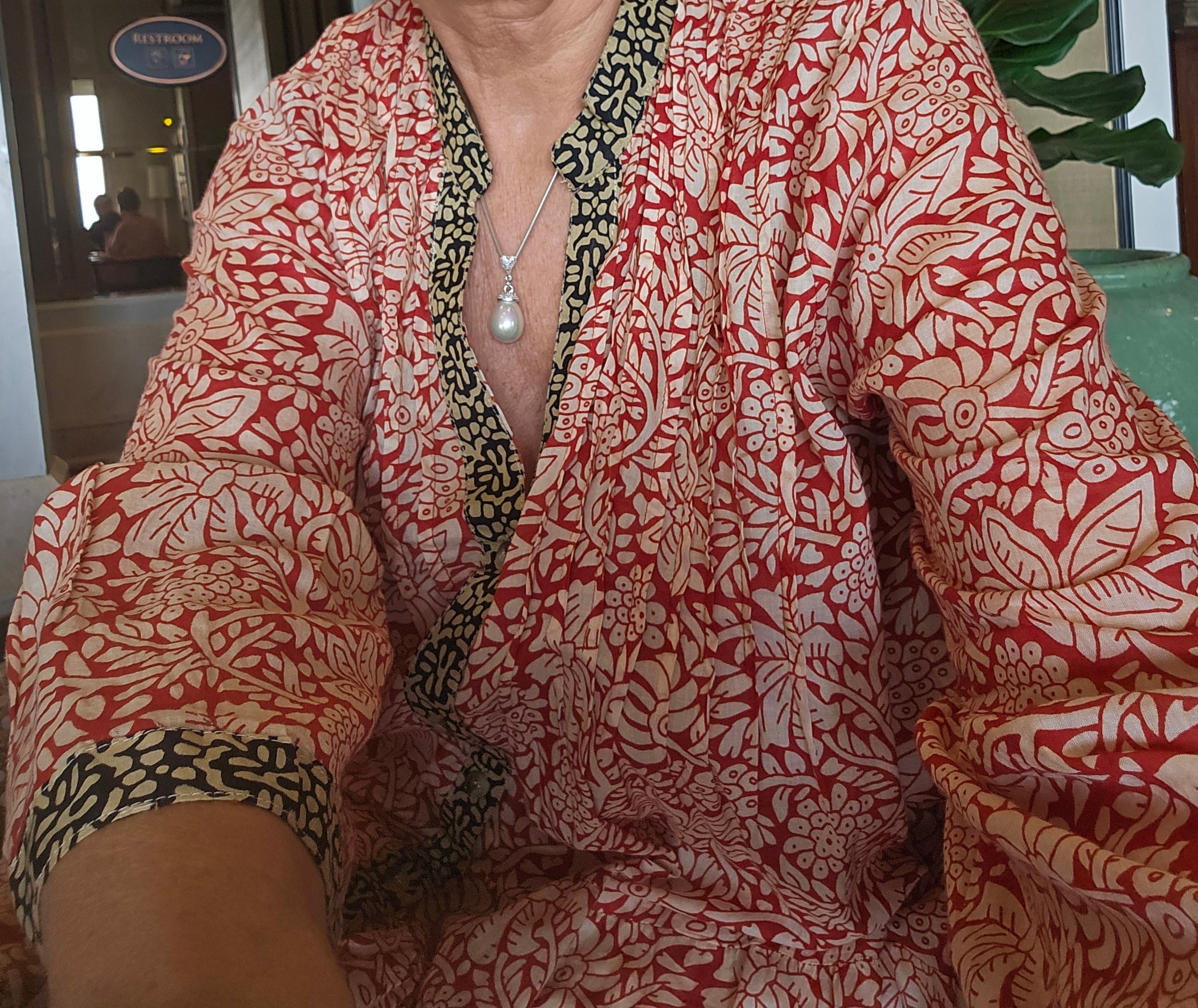 Dress with v- neck ,open front