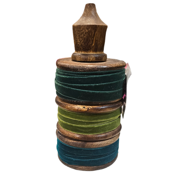 Velvet ribbon on wooden spool