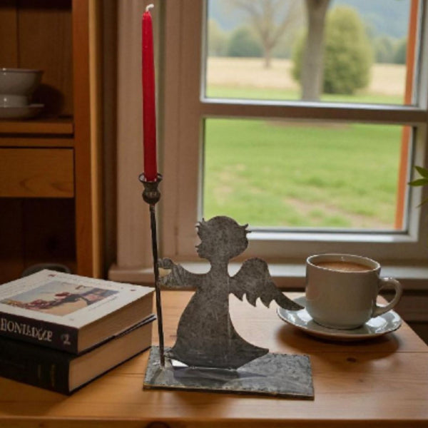 Angel holding candle